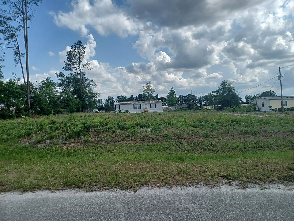 Front view of home and lot