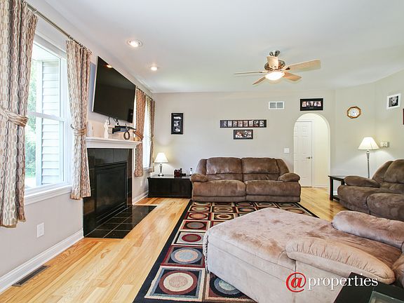 Livingroom w/ Gas Fireplace and Large Windows