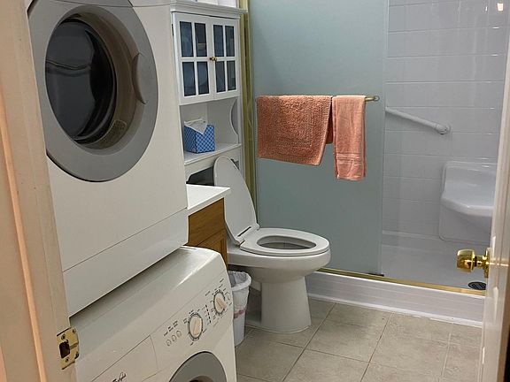 Large walk-in shower and full size washer and dryer