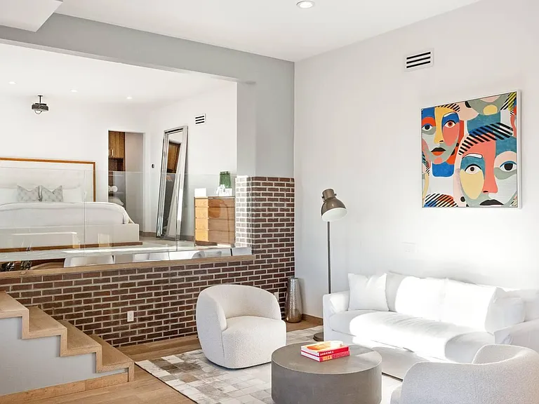 Experience tranquility and comfort in the living space of Guest Bedroom #3, a harmonious blend of style and relaxation.