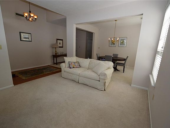 Living room to dining room and entryway.