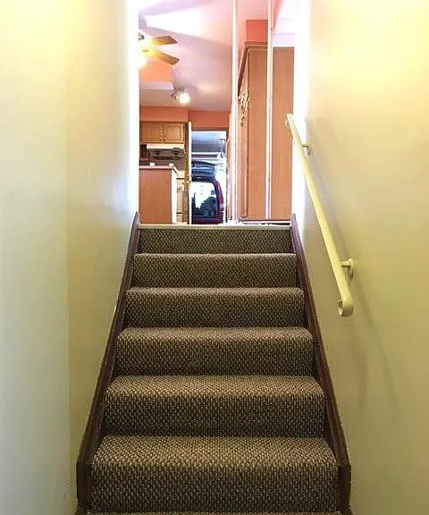 Stair from semi basement back to 1st floor