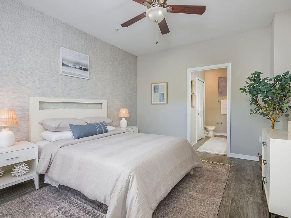 Step into your opulent haven, the spacious master bedroom. With wood-style flooring underfoot and a ceiling fan that dances to your mood, it's fit for royalty. Plus, enjoy the luxury of an ensuite bathroom and roomy walk-in closets your kingdom awaits!