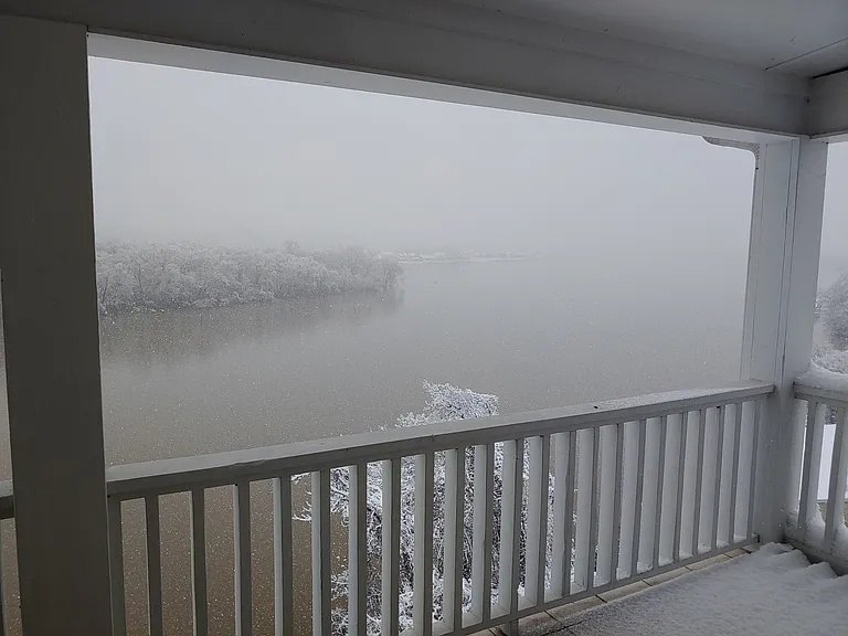 A rare view of snowfall from the balcony.