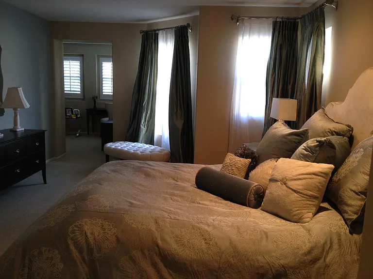 Master bedroom with large retreat off the side. May be used as a sitting area or an office.