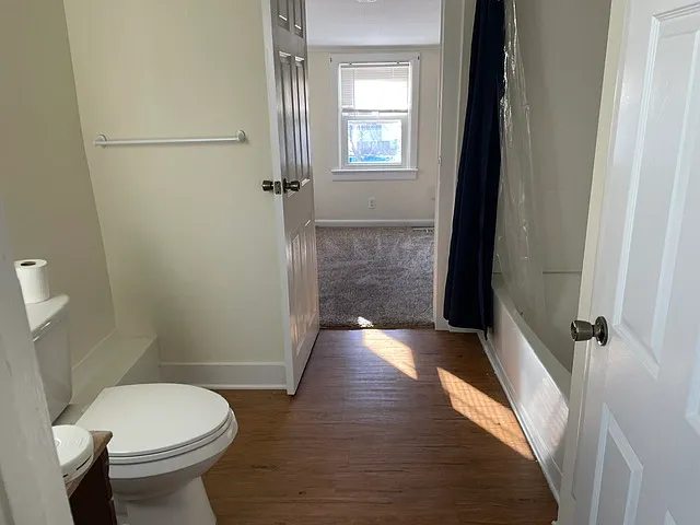 Bathroom with door to bonus room/Office/Storage.
