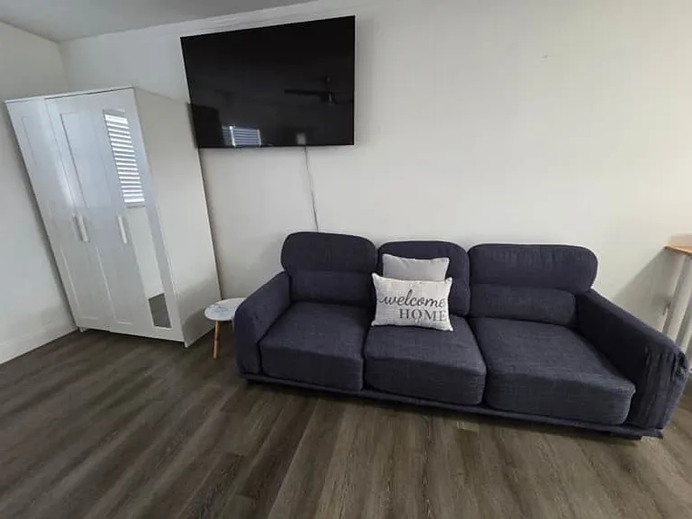 Cozy studio with sofa for two, closet, and Smart TV with Netflix