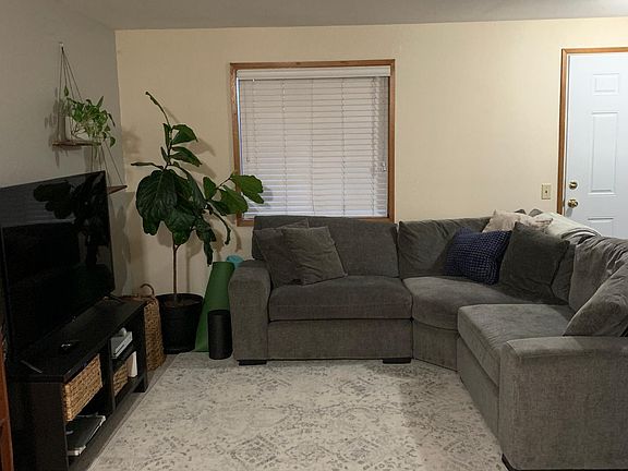 Large living area with adjoining dining space.