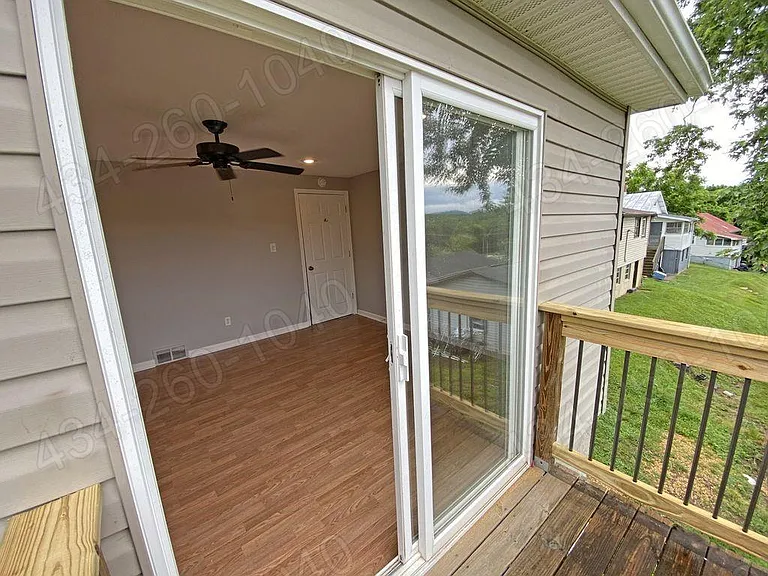 Master Bedroom with Sliding Glass Door to Deck