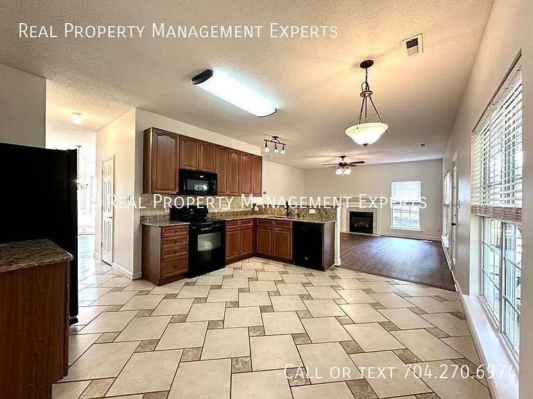 4775 Covington Dr NW — Photo 3