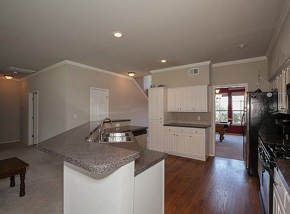 Open Kitchen - Stainless and hardwood