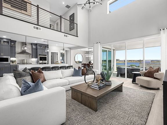 Open gathering room with double height ceiling