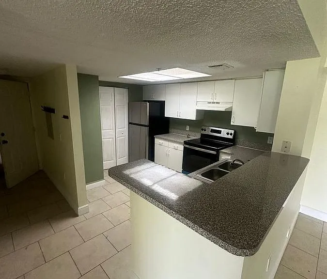 5005 Wiles Rd #102 — Photo 5