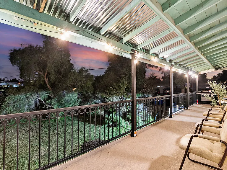 Relax and unwind on the balcony with cozy outdoor furniture and beautiful views
