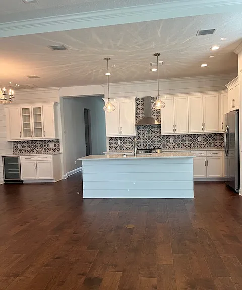 Kitchen with large Island, Quartz counters, Stainless Appliances, Wine Bar