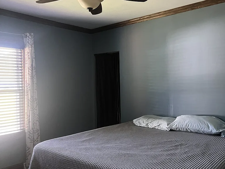 Bedroom. King-sized bed pictured (not included)