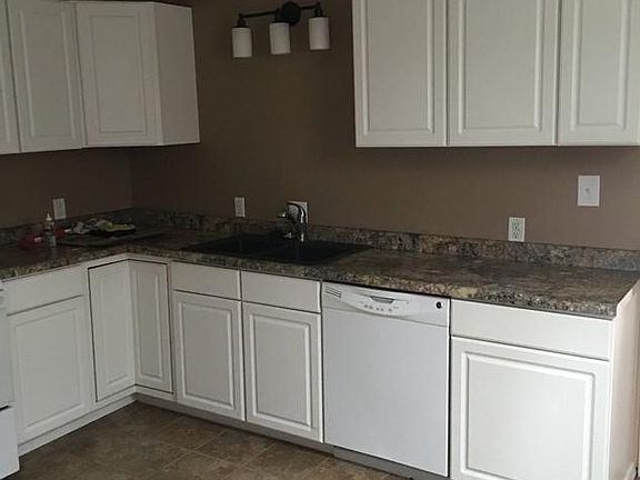 The kitchen with dishwasher and garbage disposal included. 