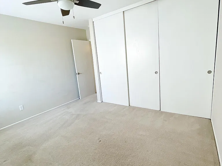 2nd bedroom. Carpet will be removed and replaced with LVP.