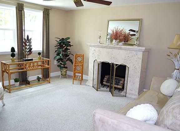 Main level den, office, or 4th BR w/adj half bath