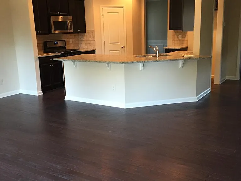 Kitchen View from Family room. Fridge is included