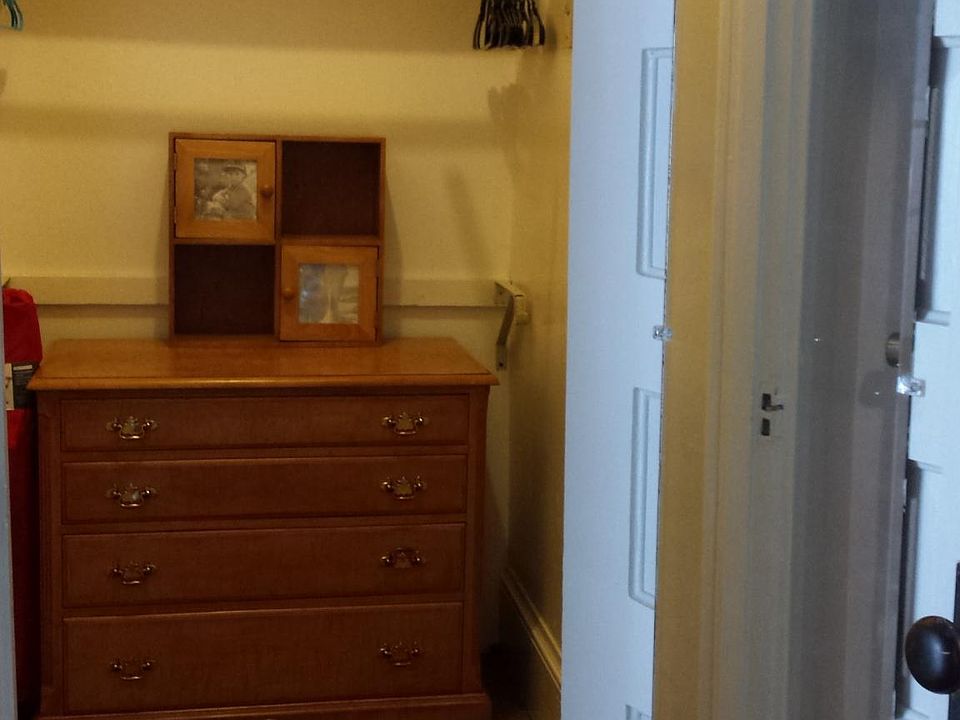 Spacious closet located between kitchen and back door