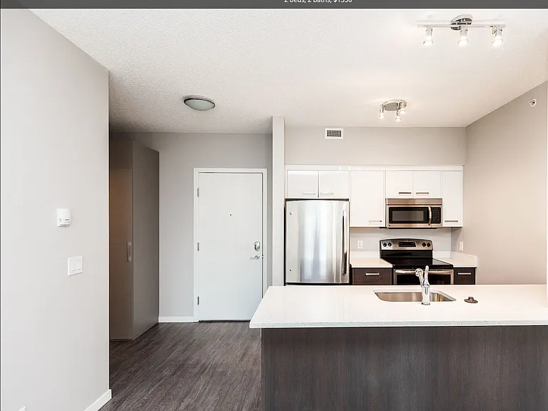 104 Mackenzie Way SW — Photo 12