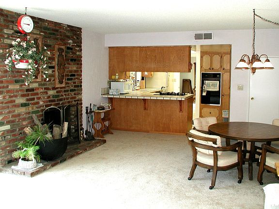 Spacious family room with used brick patio