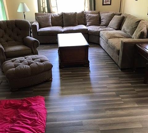 HugeLiving room with hardwood floor