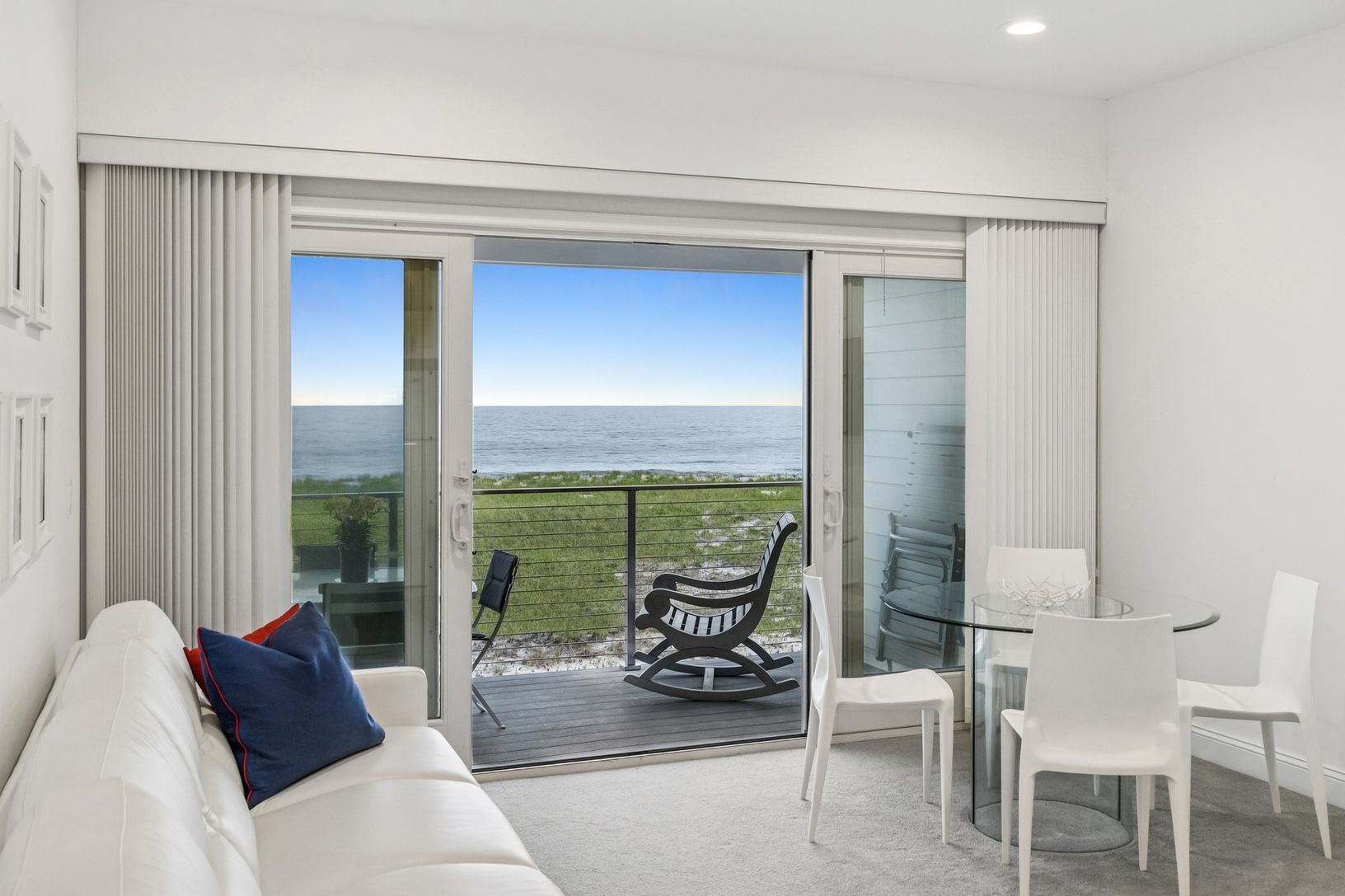  Sliding glass doors lead to private covered beach and ocean view porch.