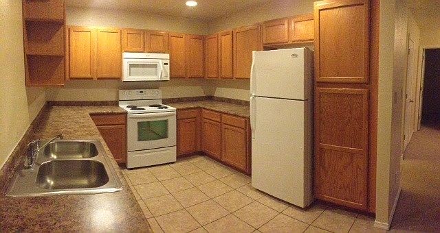 2nd image of 2401 Chelwood Park Blvd NE APT H
