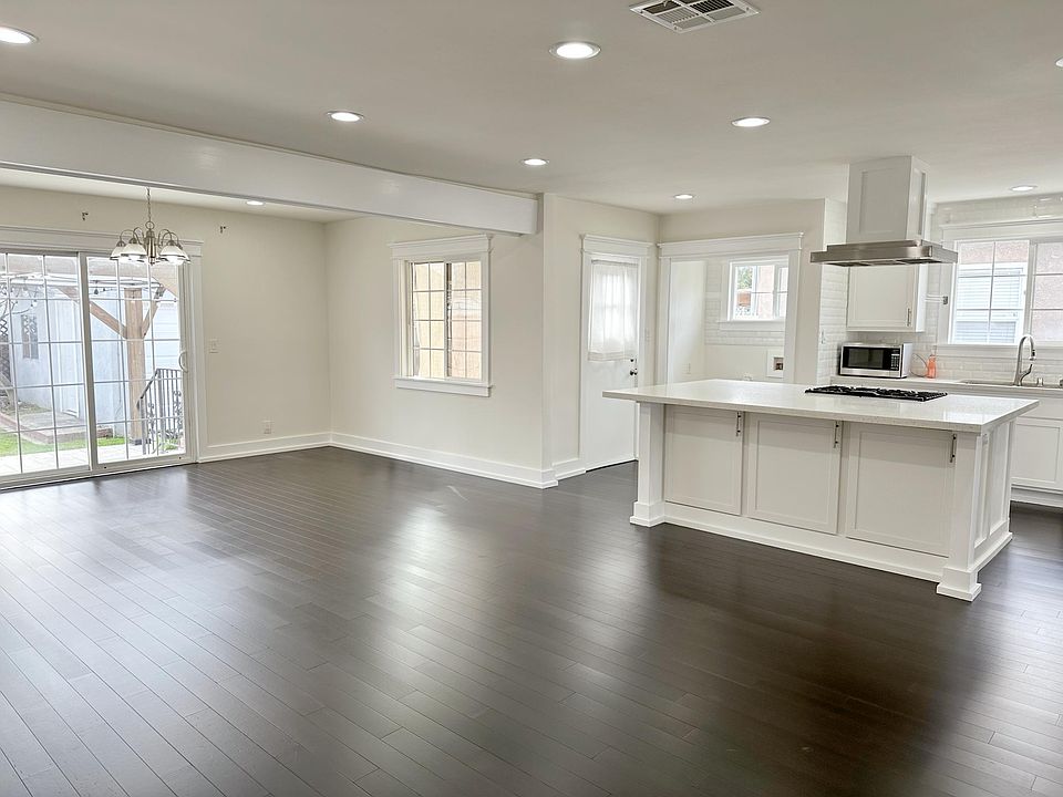 Open concept kitchen, living room, dining space