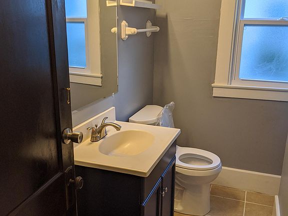 All new bathroom with HUGE mirror and Hollywood lights. Brand new toilet and tile walk-in shower.