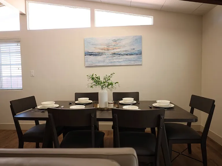 The dining table hosts up to 6 people.
