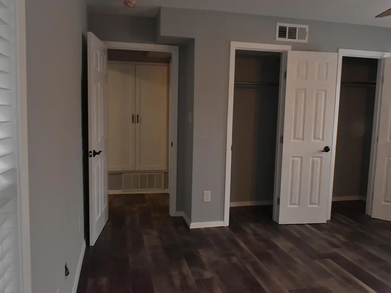 Bedroom closet and hallway view