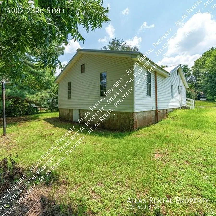 4BR/2BA Home with Granite, Luxury Flooring & Fenced Yard Ready to Rent! — Photo 3