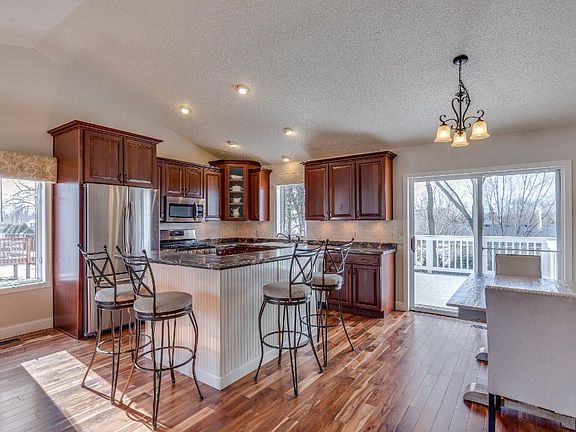 Incredible open floor plan accented by beautiful acacia hardwood floors! Acacia is an extremely hard, durable wood.