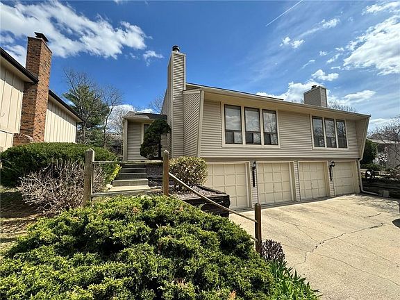 Huge driveway with easy access to 2-car garage. Professional landscaping and lawn care included.