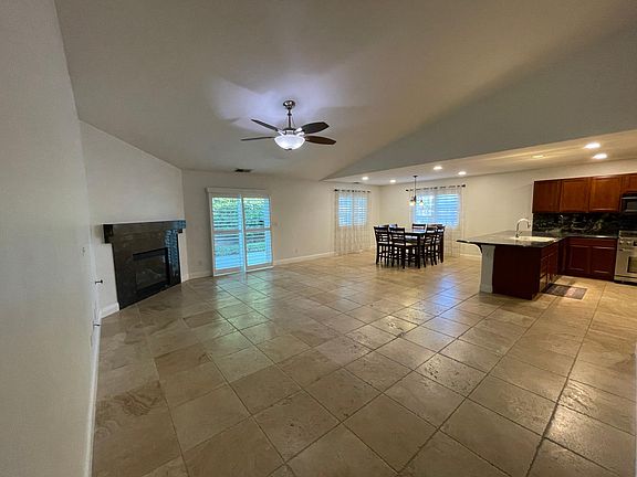 Open concept overview of Great Room, Dinning Room and Kitchen