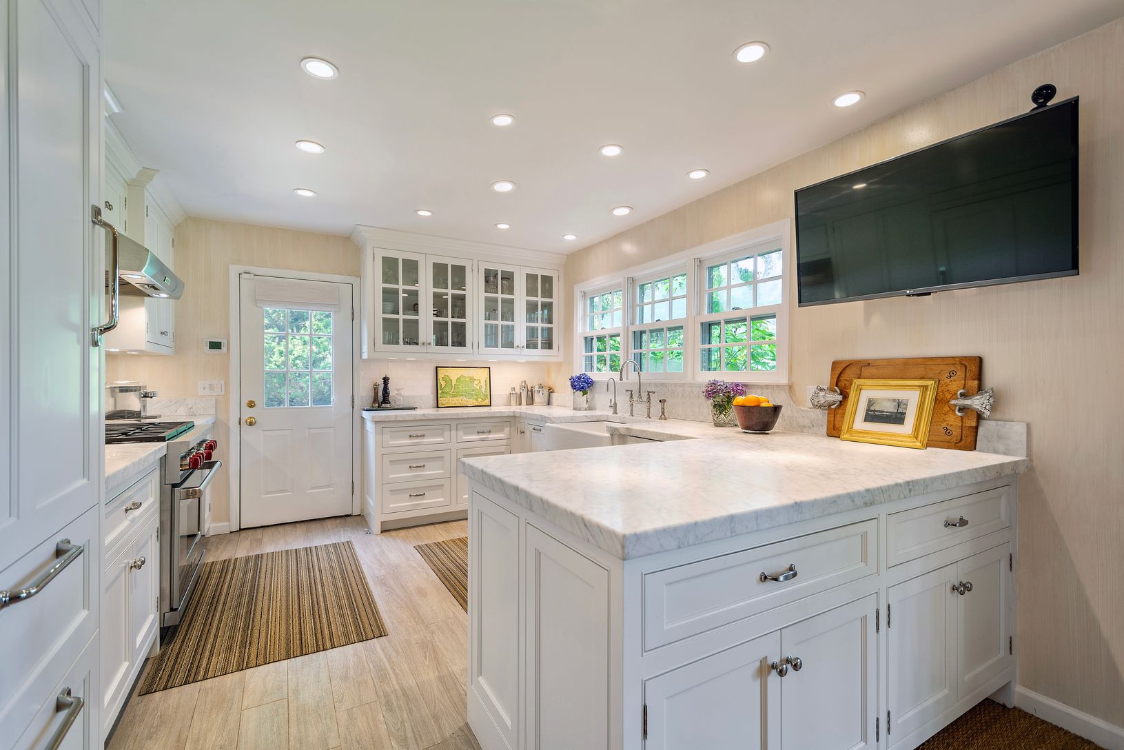Chef's kitchen with marble counters; side entrance
