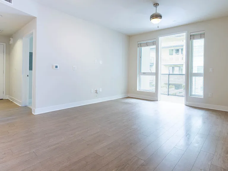 Living Room with Balcony and Hard Surface Flooring