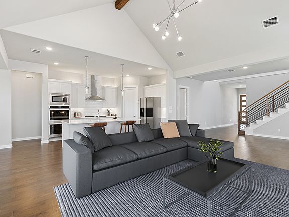 Open first floor in the Denali home plan by Trophy Signature Homes - REPRESENTATIVE PHOTO