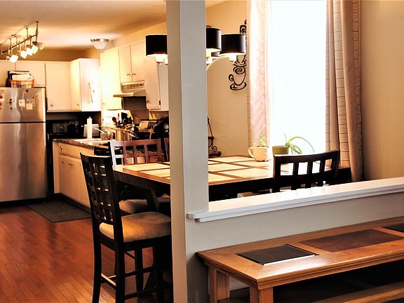 Opening from living room into kitchen...bright and sunny