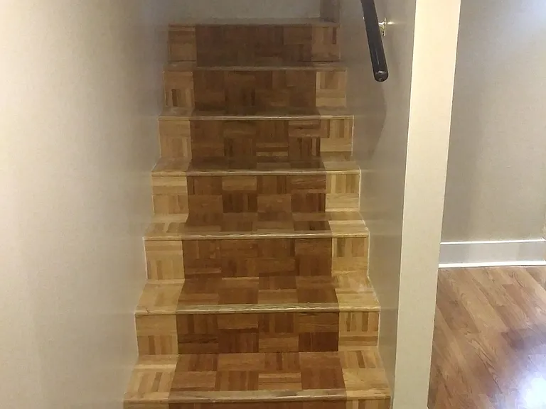 Stairs heading up to main floor
