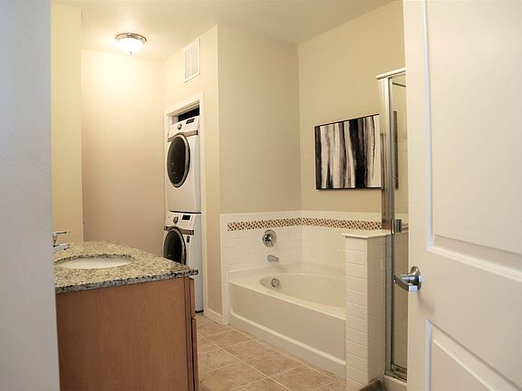 Separate bathtub and shower. Washer and dryer included.