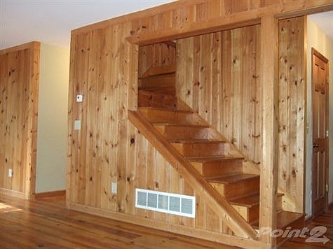 Beautiful Pine Tongue & Grove Staircase Leads to Second Floor