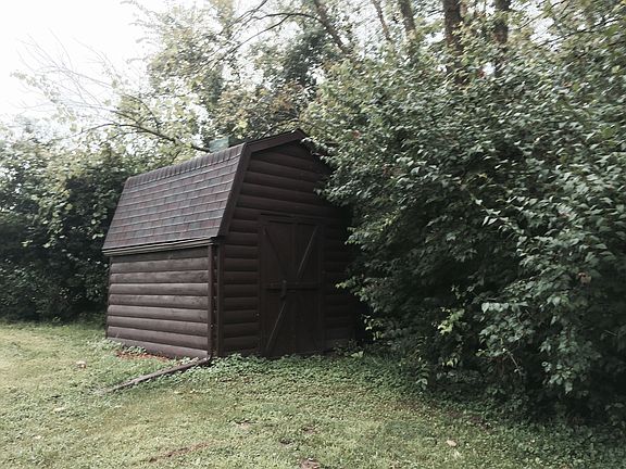 Log-Sided Storage Shed