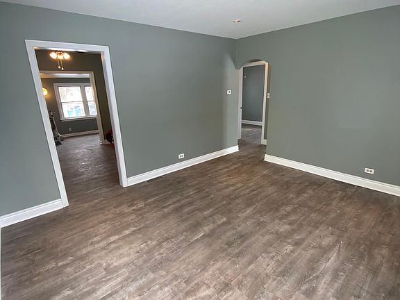Fully restored Front room with LED lighting, Vinyl Planking throughout the entire first floor.