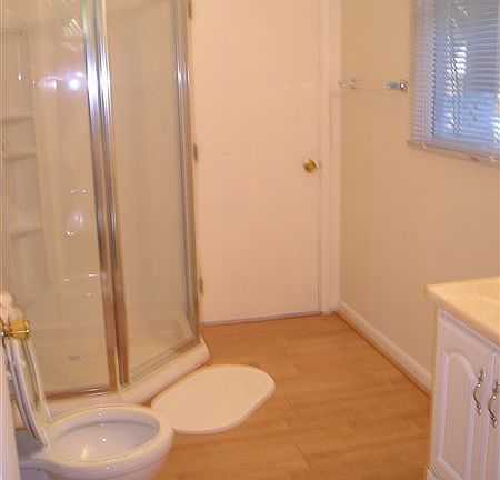 1st floor new bathroom with hardwood floors