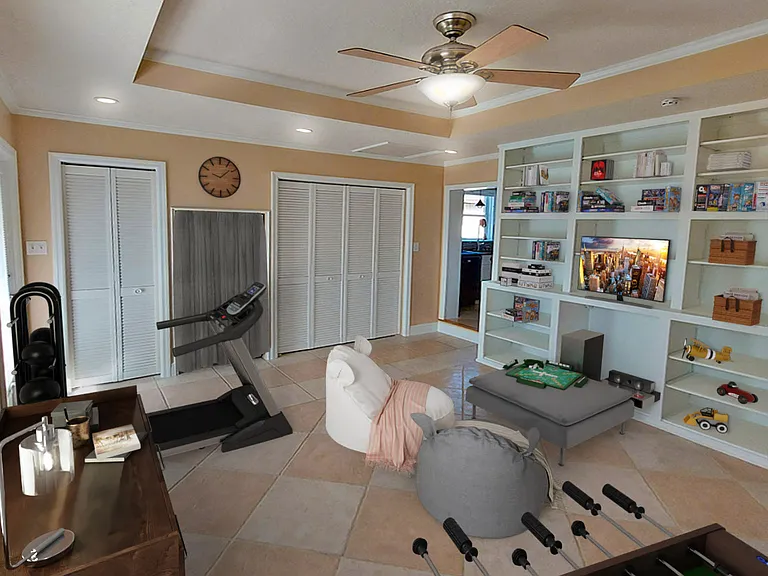 Bonus Room - Staged
looking from Living Room - Laundry Closet, Built-in Extra Storage, and Pantry. Backdoor to covered patio area to left. Built-in Shelving Storage to right