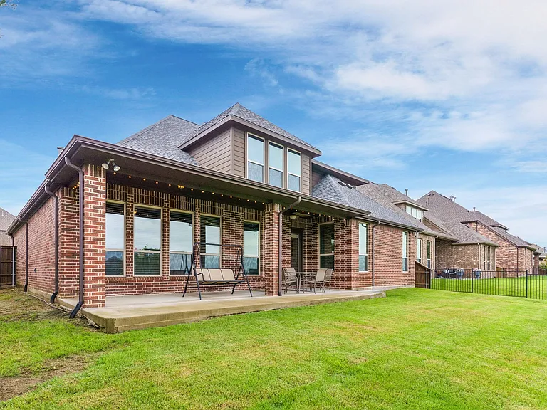 Dine al fresco or enjoy a backyard that's ready for a future playset, sports goals, fun for kids & pets....plenty of room for play all year long.
